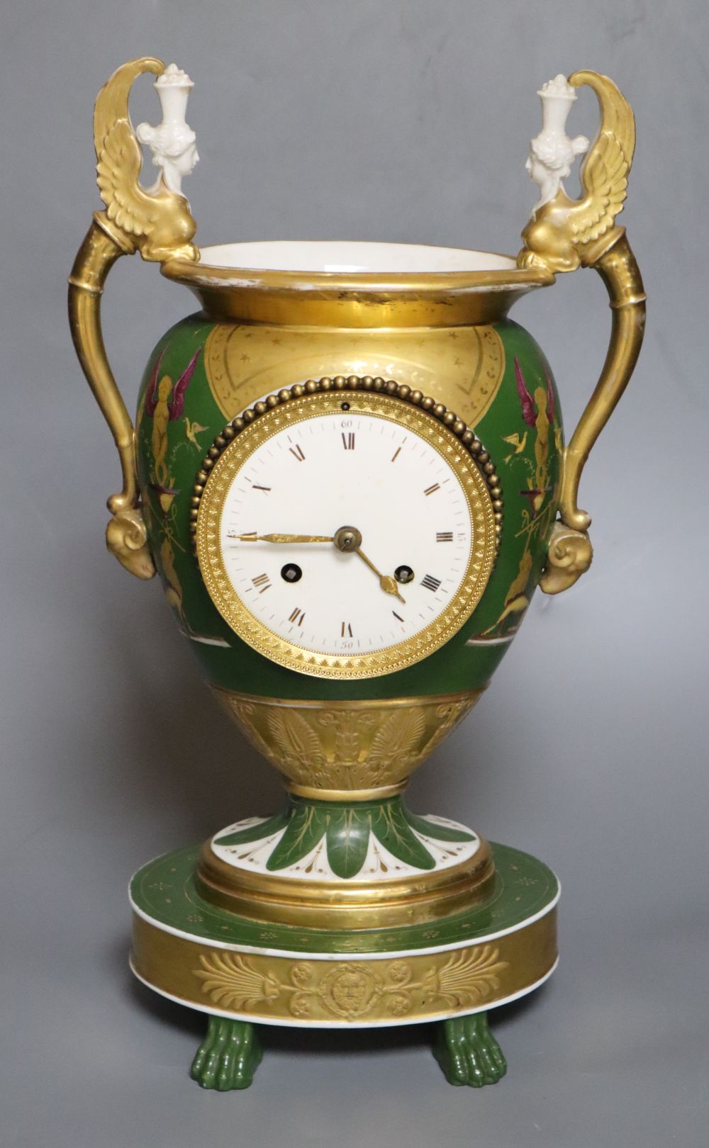 A 19th century French porcelain mantel clock, height 37cm